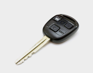 stock-photo-the-key-from-the-car-with-buttons-lies-is-isolated-on-a-white-background-62814421-300x238